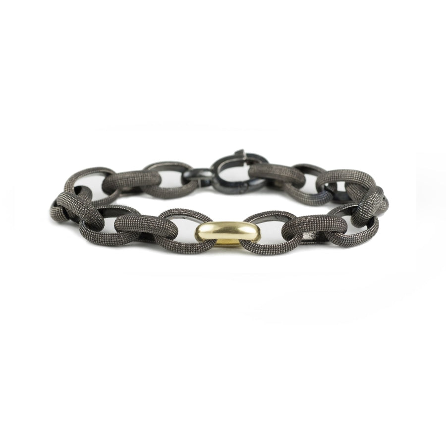 Black rhodium textured silver link bracelet with yellow gold accent link