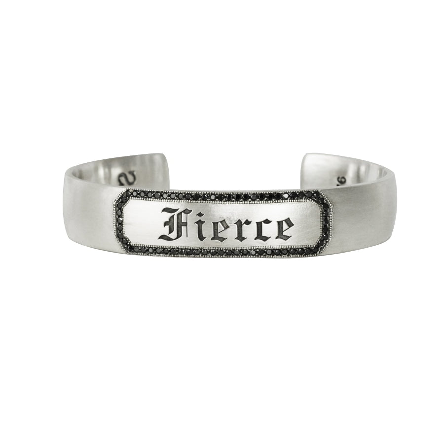 Custom engraveable sterling silver cuff bracelet with black diamond border and engraved message reading "Fierce" in fine gothic lettering
